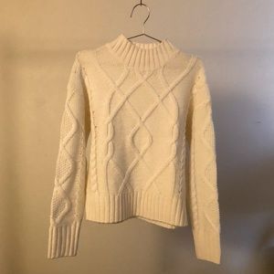 Cream, off white cable-knit turtleneck sweater retro beatnik mod neutral